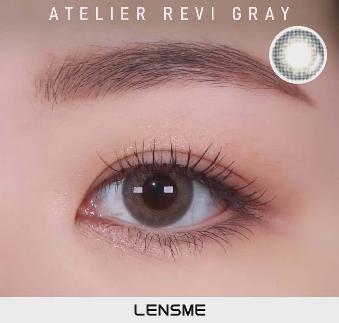Close-up of eye wearing Revi Gray toric contact lens featuring a natural grayish color for a mature, colorful look.
