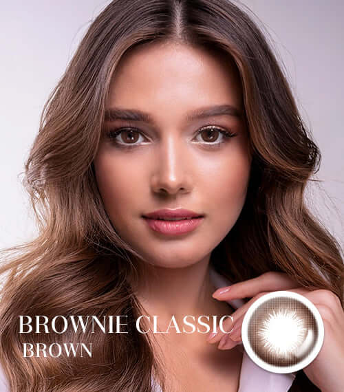 Woman wearing Brownie Classic Brown toric contact lenses, enhancing her eyes with a natural dark brown look. Product ID: K016CH